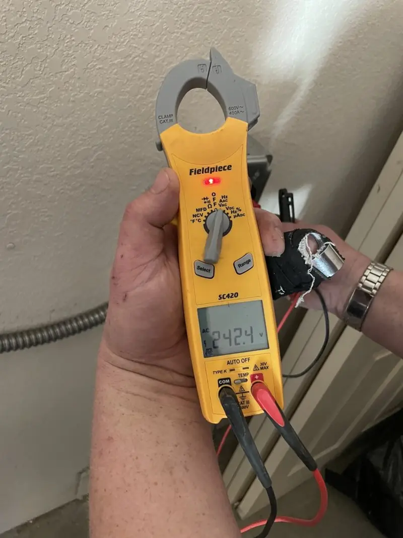Voltage testing with clamp meter during Ceiling Fan Installation in Poughkeepsie